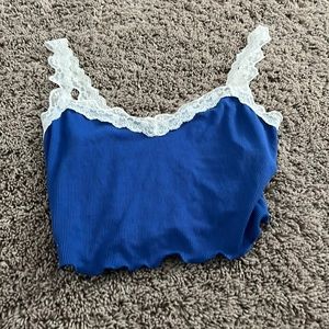 Lace straps and lunging of blue crop